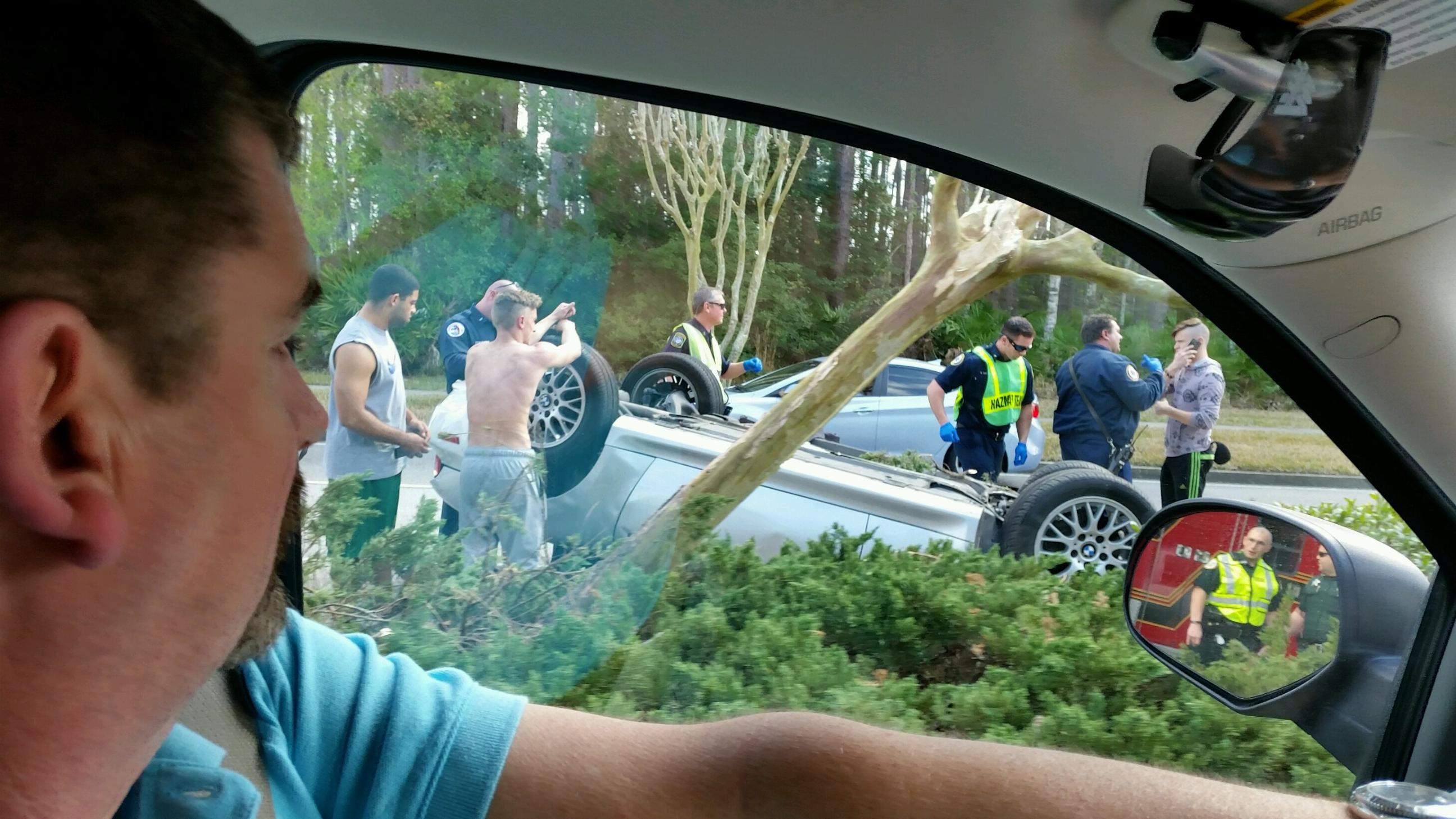 Viewer captures car flipped over in Fleming Island