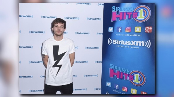 One Direction S Louis Tomlinson Arrested After Altercation With Paparazzi