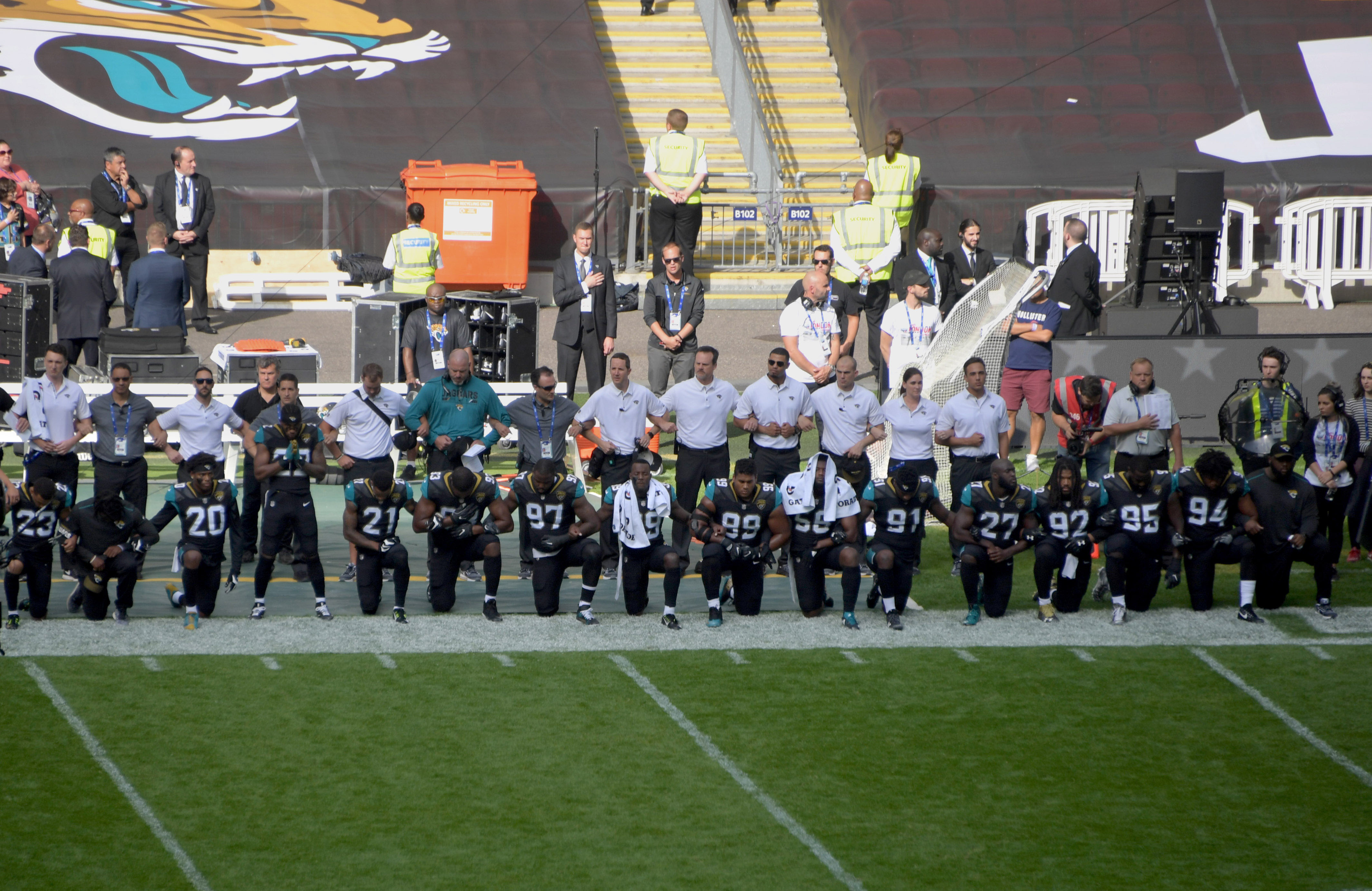 Ravens and Jaguars Players Kneel and Lock Arms During National Anthem