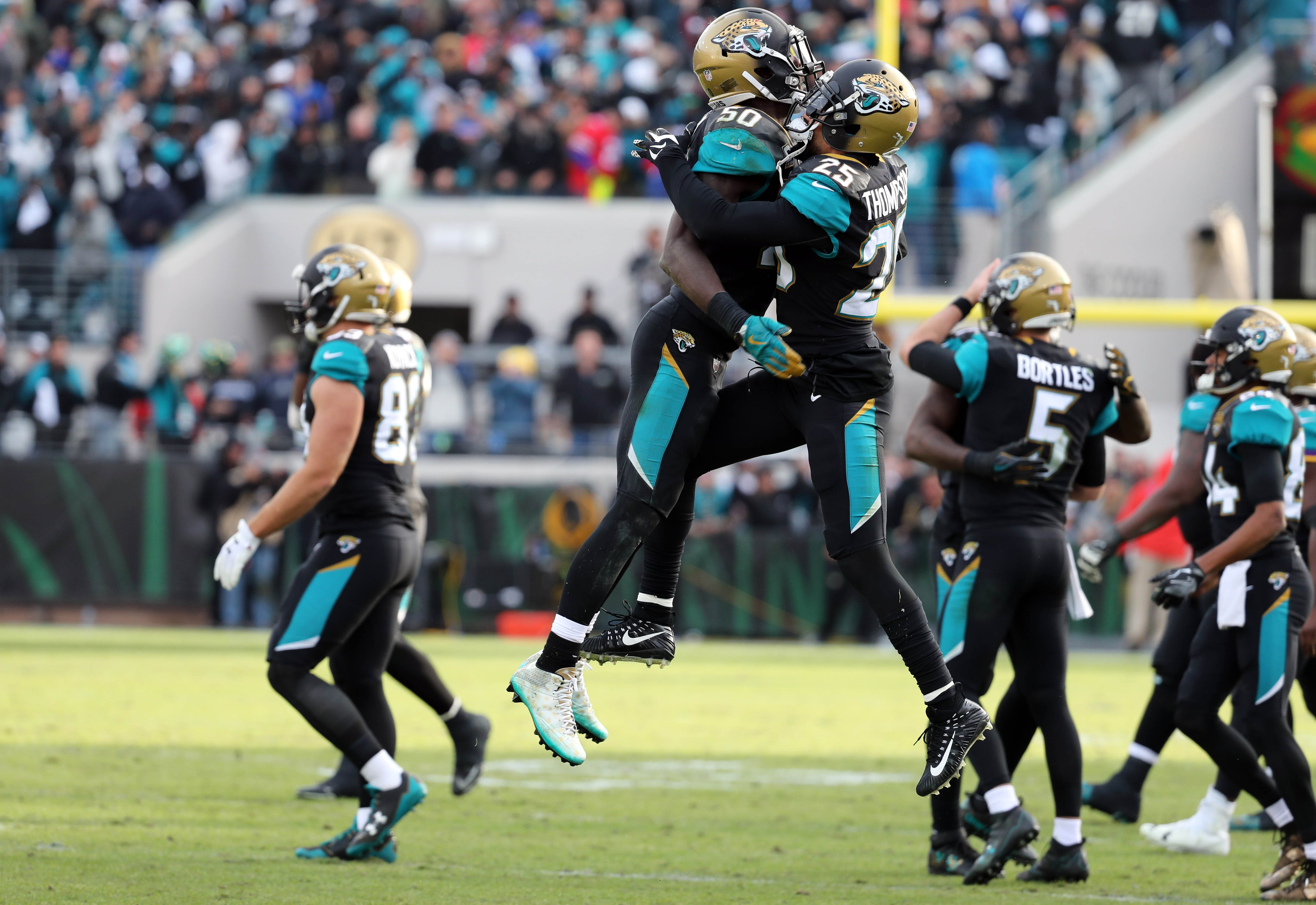 Jaguars celebrate first playoff win 'It's special because we're all